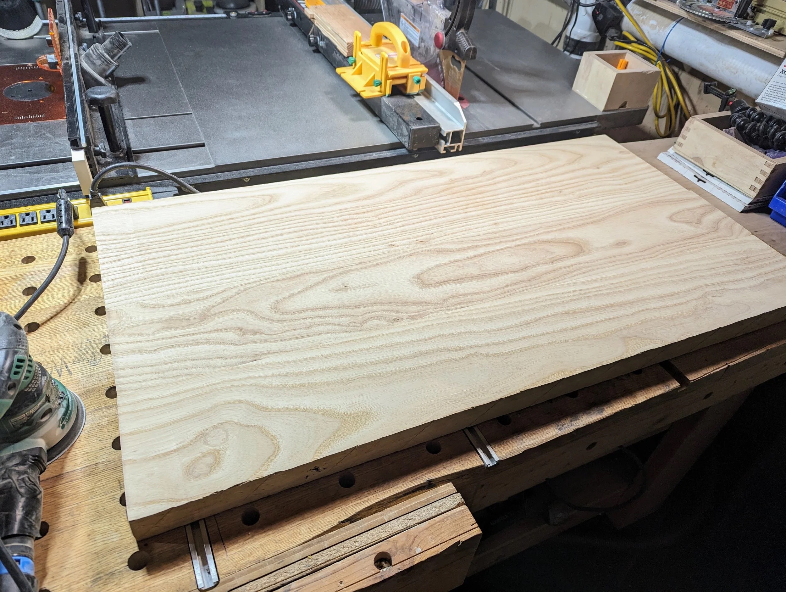 Glued ash panel on the workbench, ready for shaping