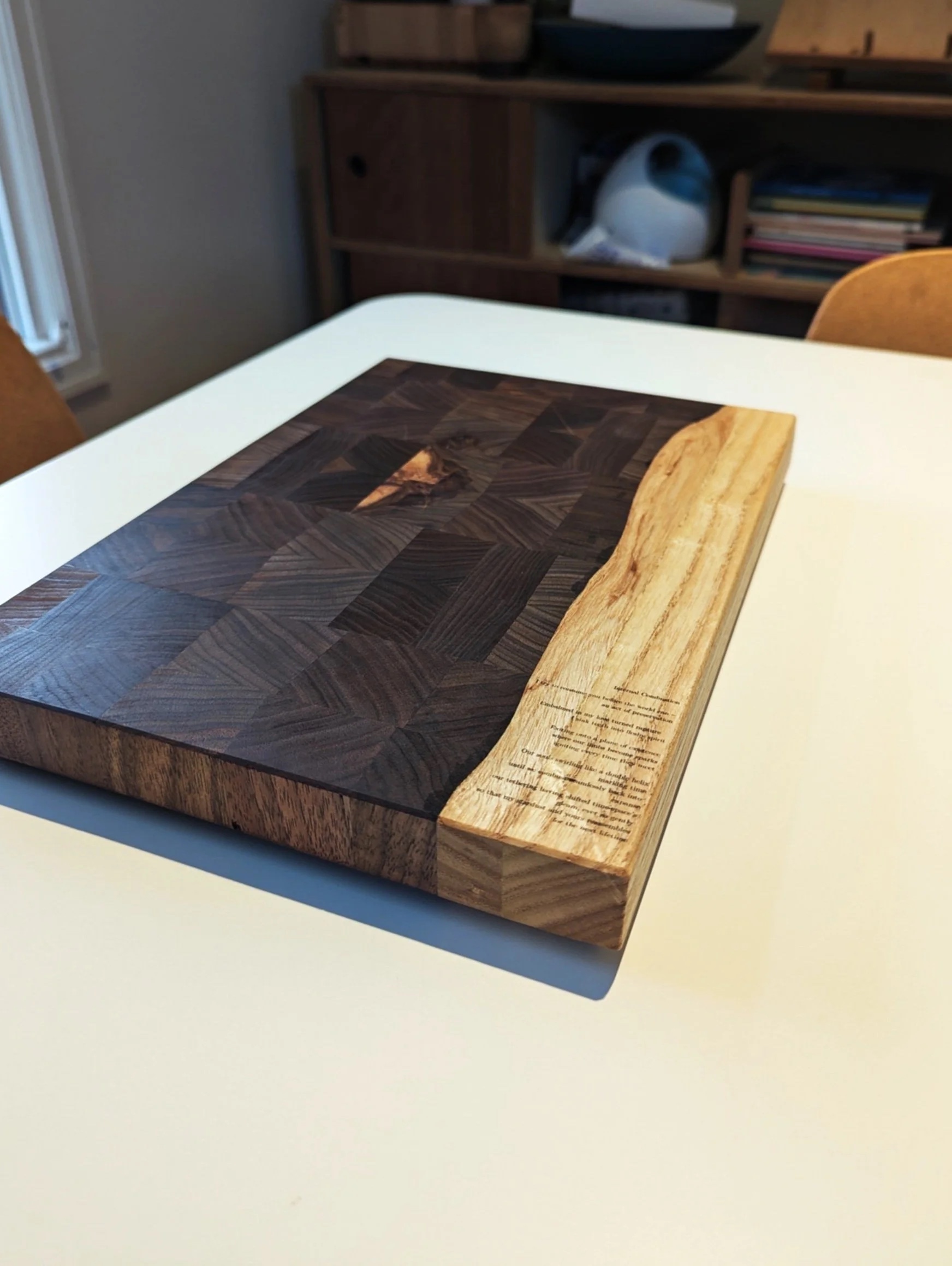 Custom end-grain cutting board with laser-engraved poem — walnut and oak