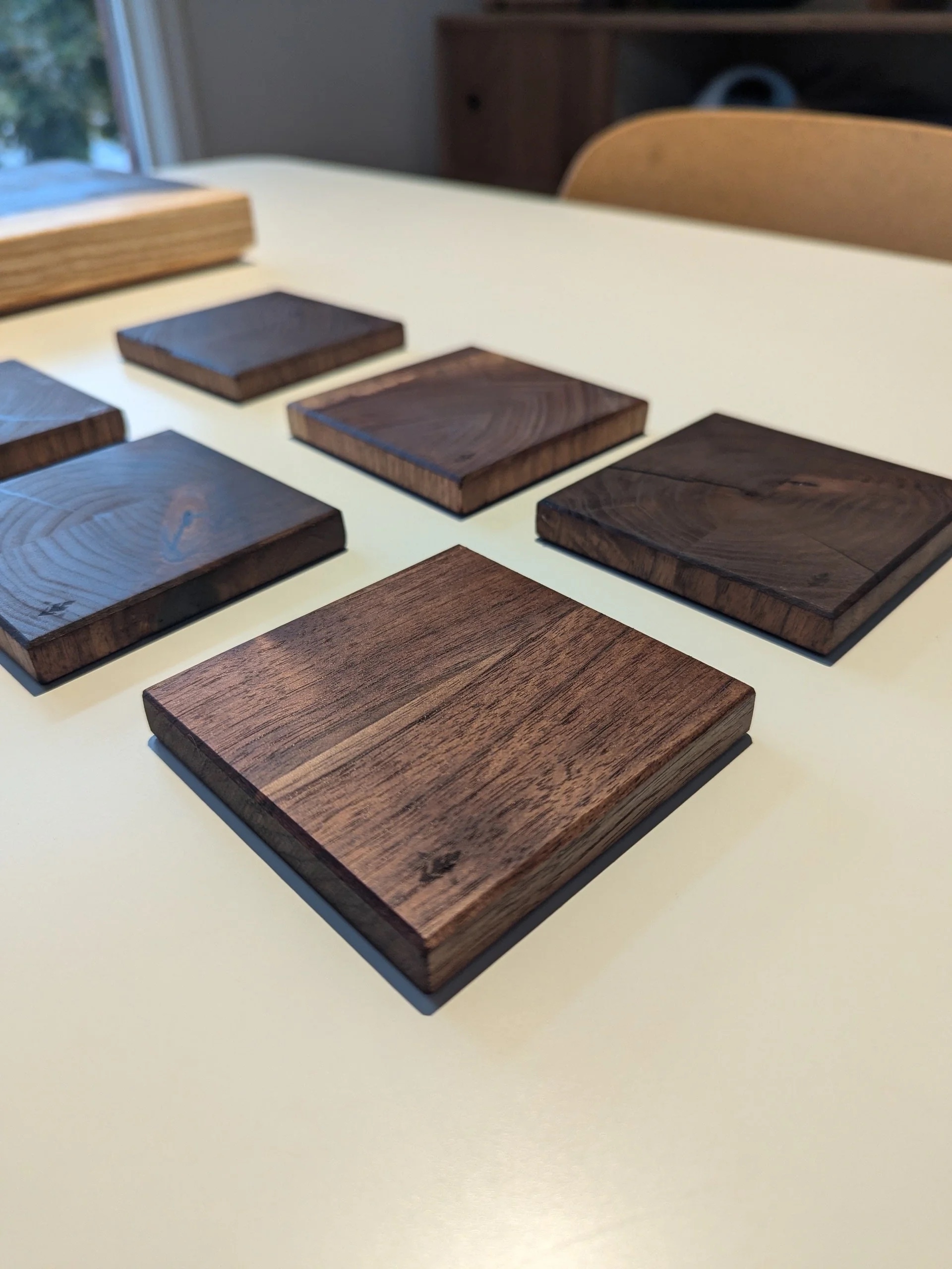Matching walnut coasters — end-grain detail