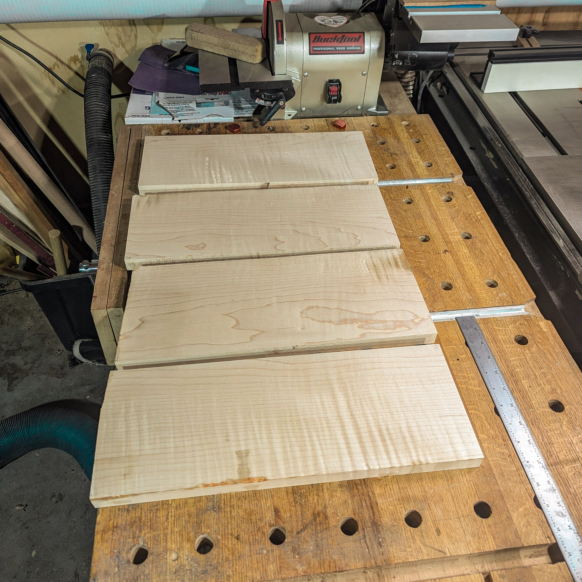 Four maple panels showing figured curl grain