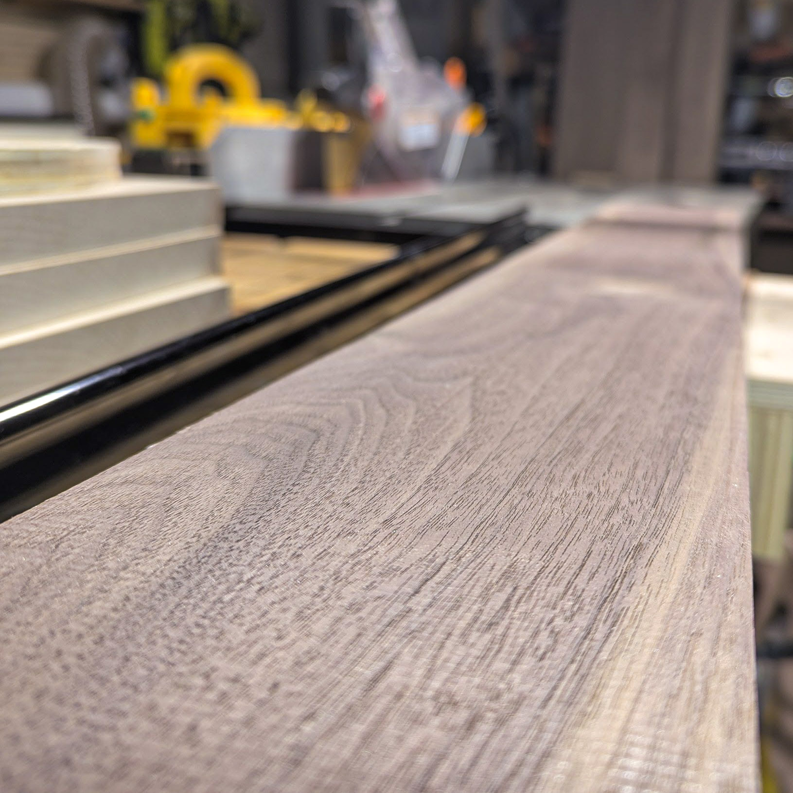 Raw walnut board — close-up of the grain