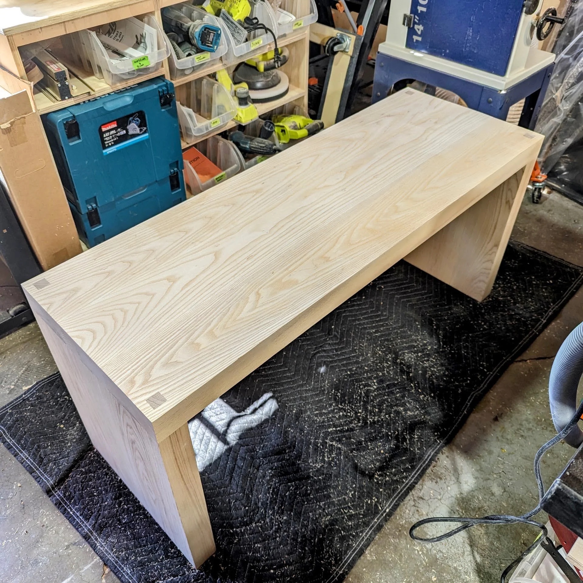 Finished bench in workshop — all joints tight