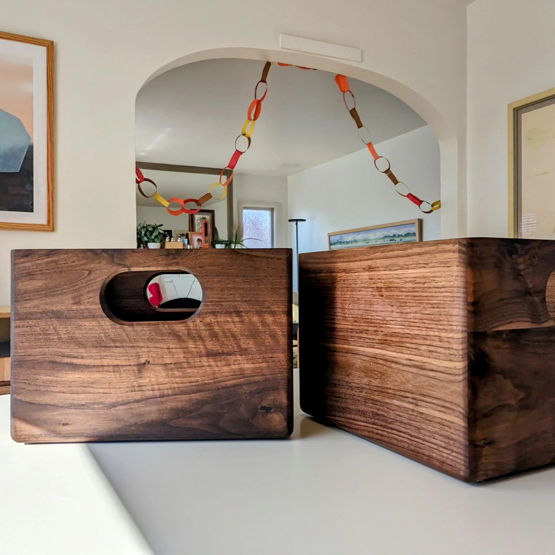 Solid walnut crates with rounded handle cutouts