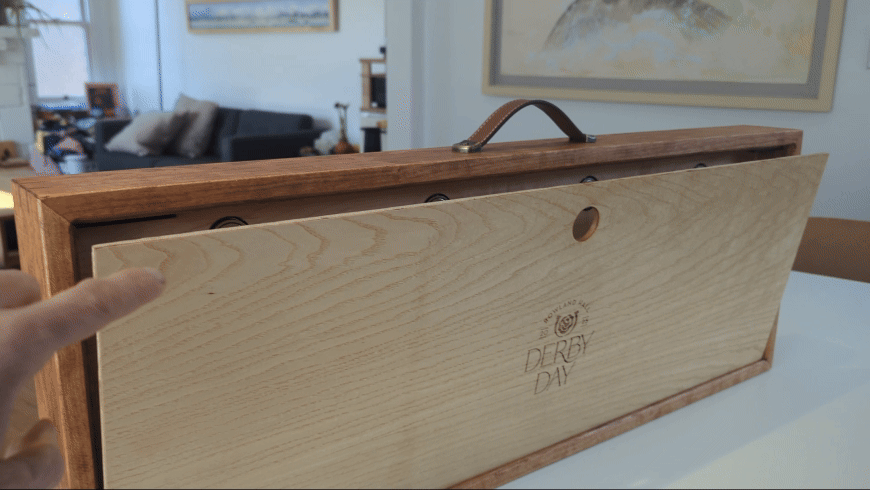 La Herradura — sliding lid mechanism in action, cherry frame with tiger maple panel