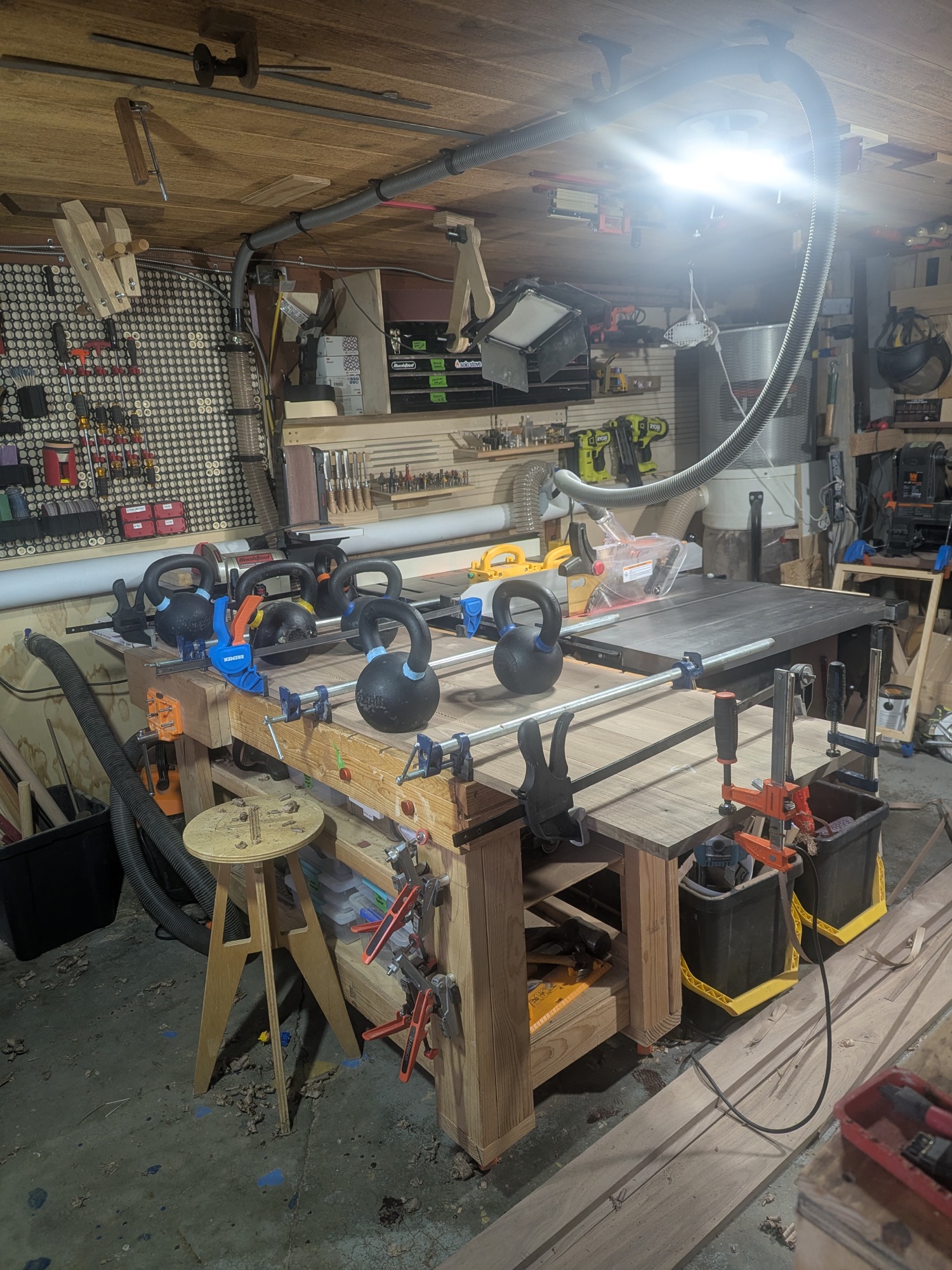 Glue-up weighted with kettlebells — unconventional but effective