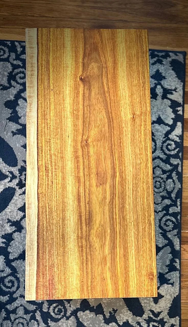 Top view of the canary wood slab showing stunning golden grain patterns