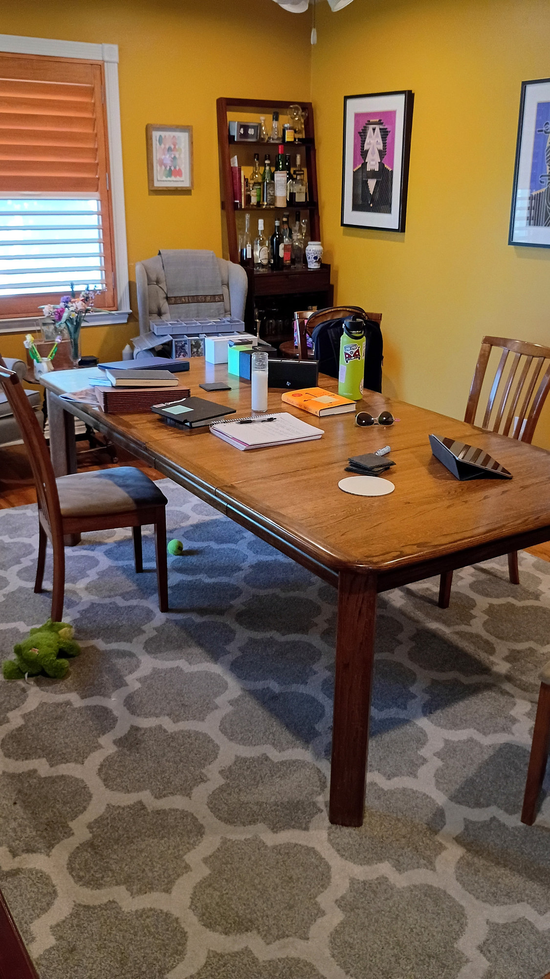 The heirloom white oak dining table in its room, set for everyday life