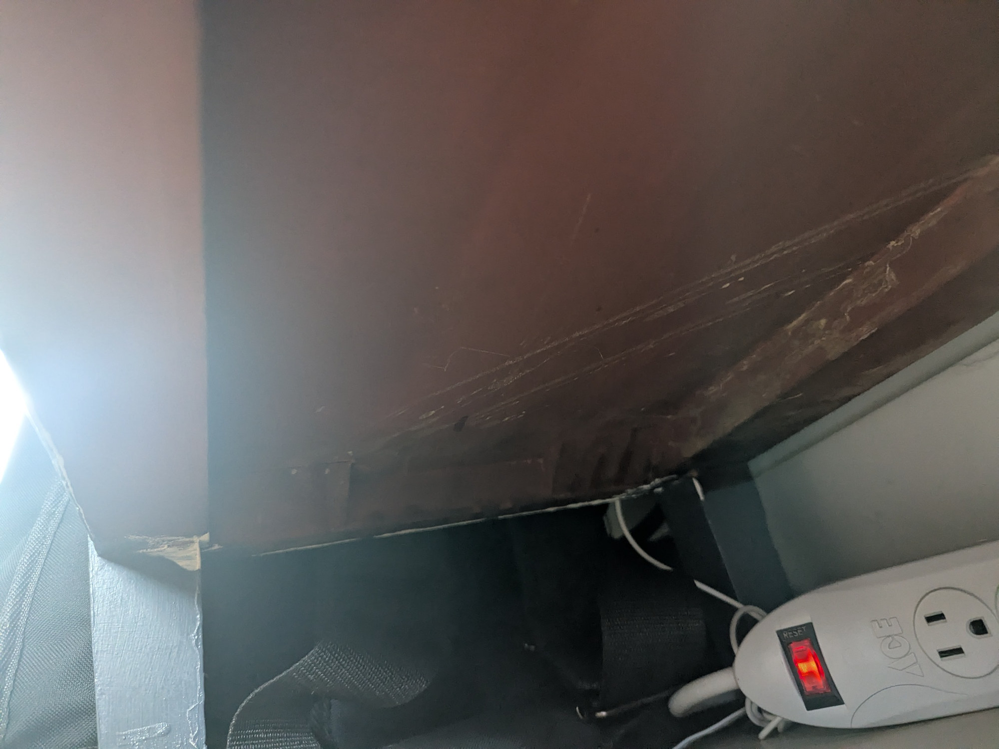 The unpainted underside of the cabinet: the original mahogany, still there
